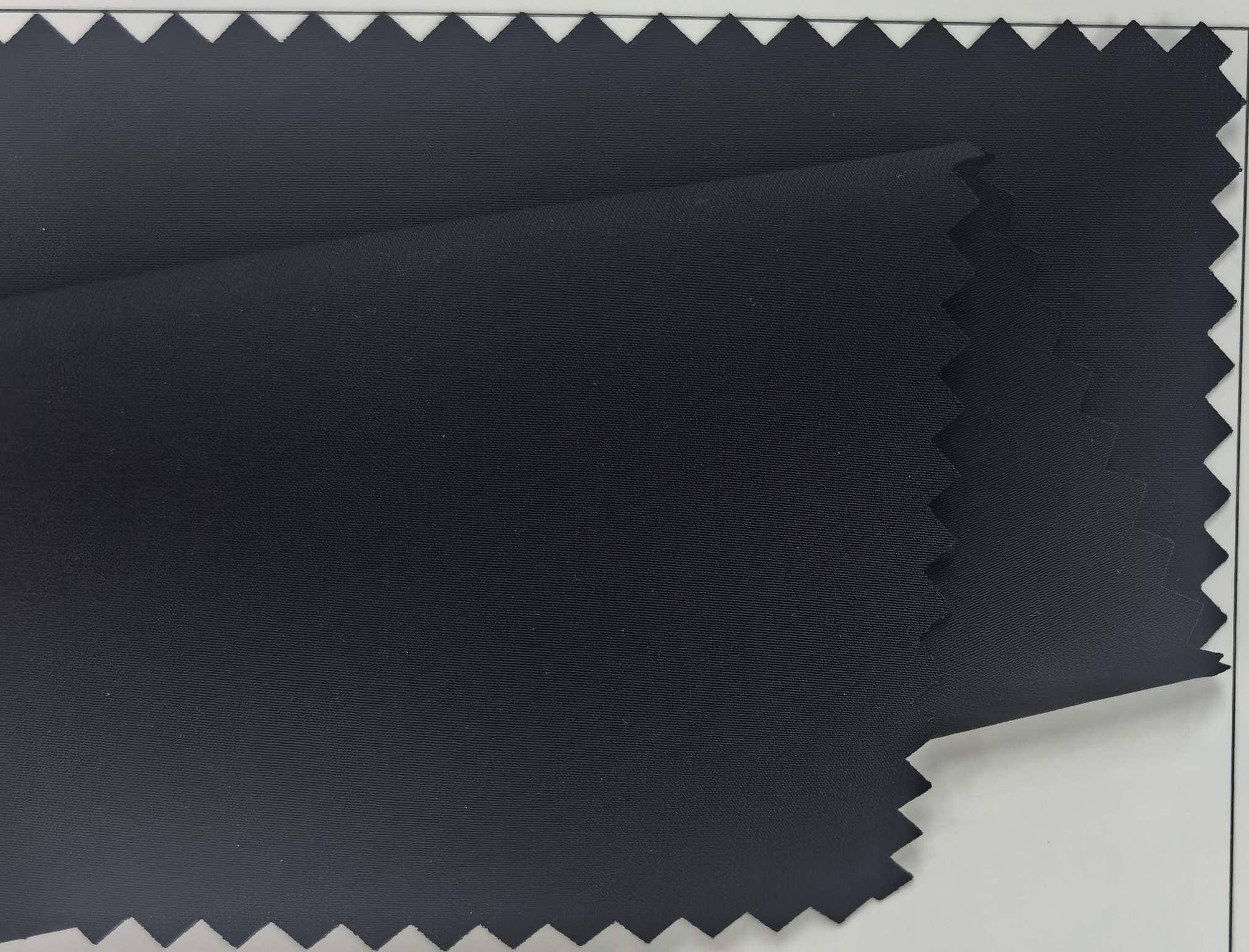 30D机包平纹尼龙四面弹